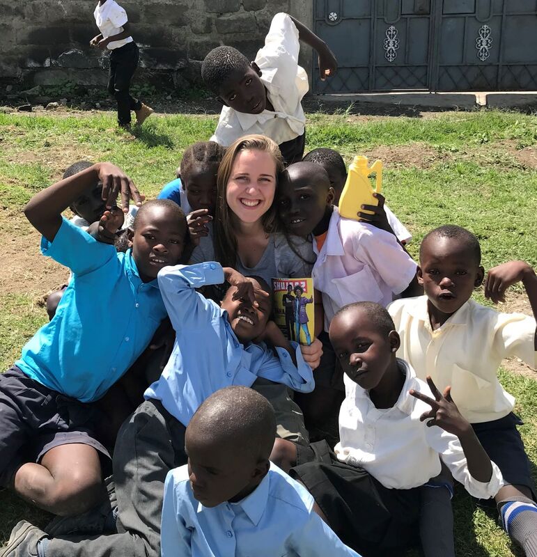 volunteer with kids in Africa